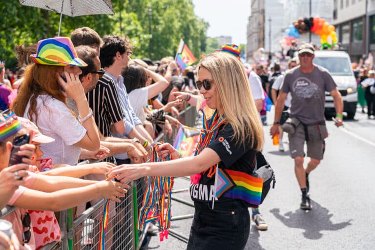 Elton John AIDS Foundation handing our whistles at the London Pride Parade 2024