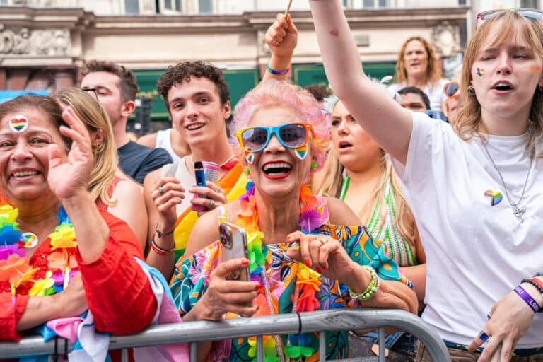 London Pride 2024 crowd smiling and cheering