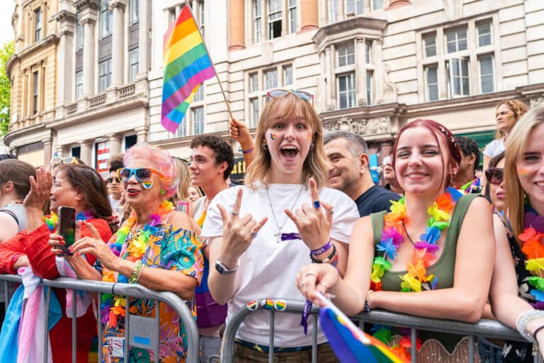 London Pride 2024 crowd smiling and cheering