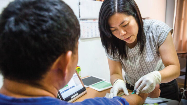 A male patient is being tested for HIV at MAP Foundation Health Testing Center, ChiangMai, Thailand.