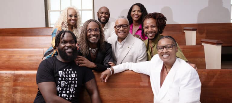 Billy Porter sits with the team at Vision Community Foundation in Atlanta, Georgia.